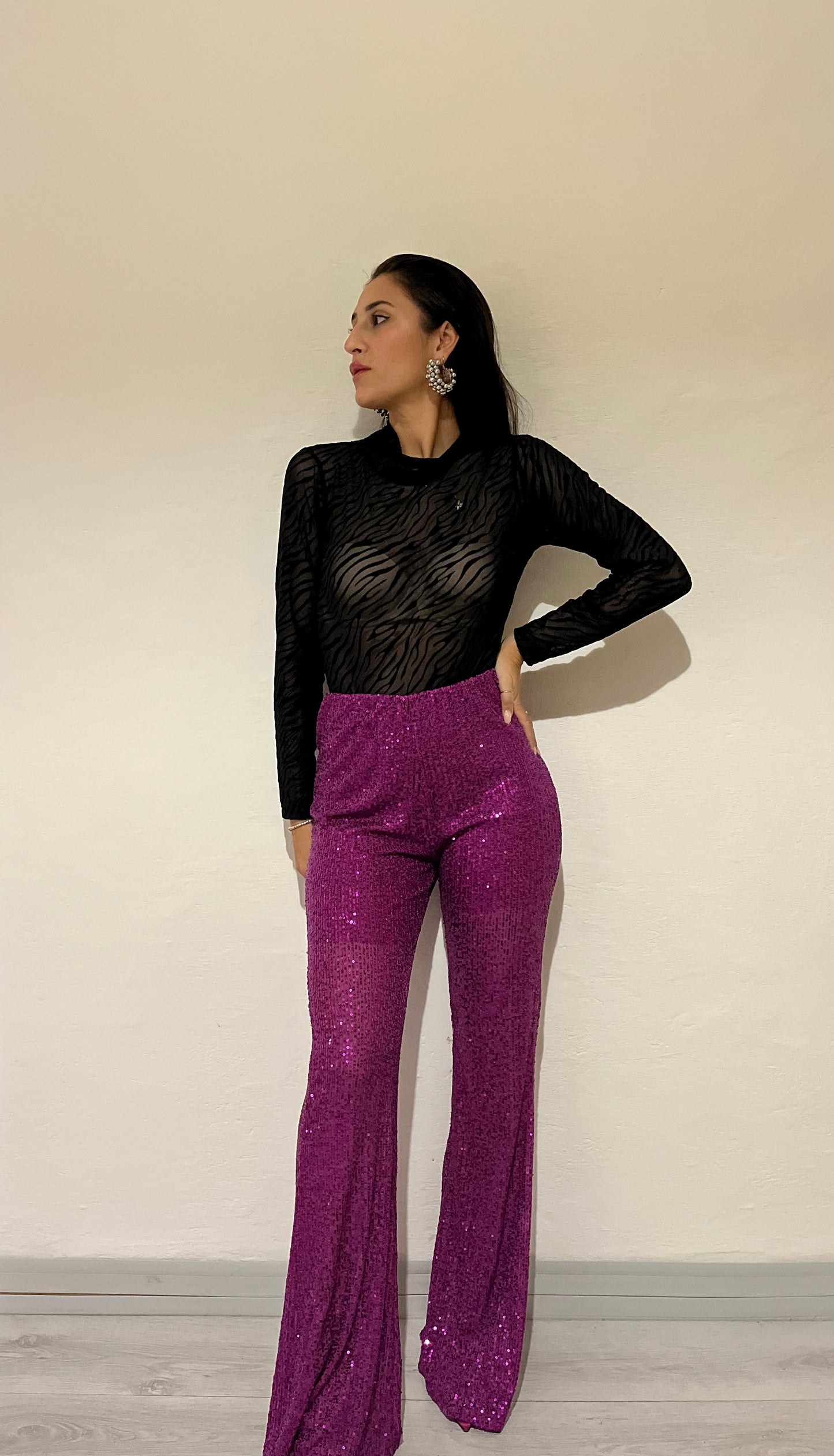 Pantaloni a campana con paillettes