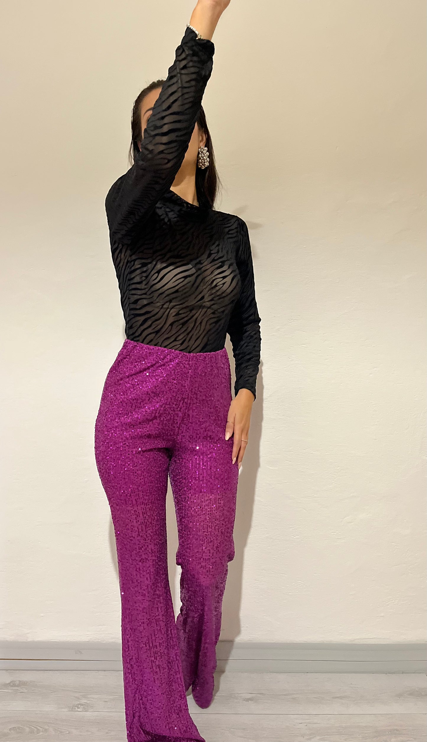 Pantaloni a campana con paillettes