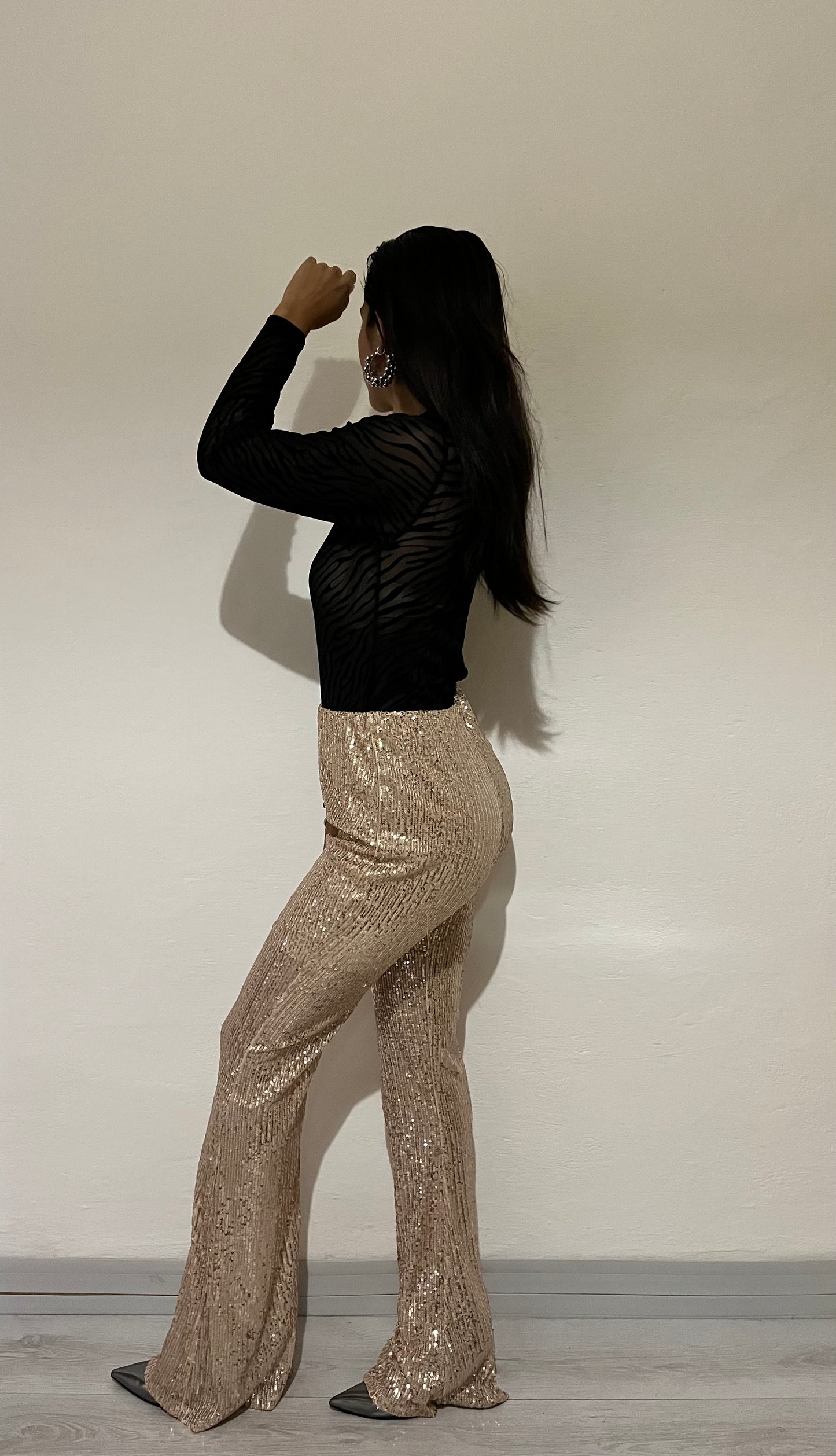 Pantaloni a campana con paillettes