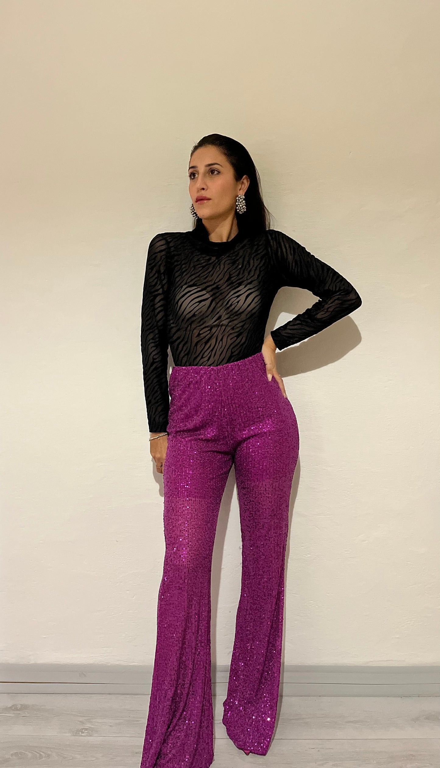 Pantaloni a campana con paillettes
