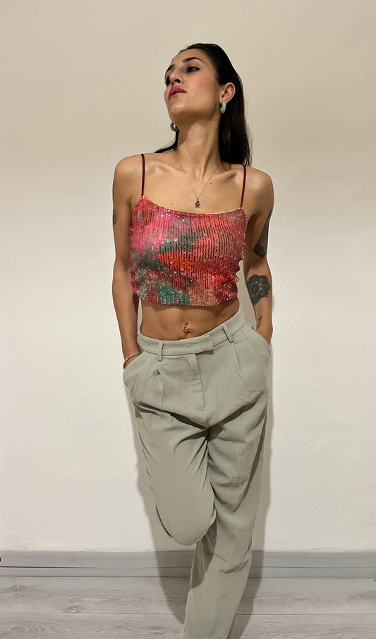 Top con laccetti sottili e paillettes