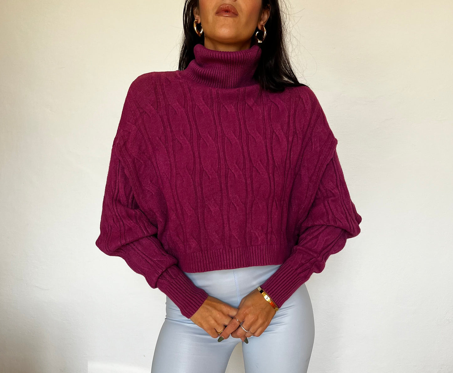 Maglione cropped con collo alto